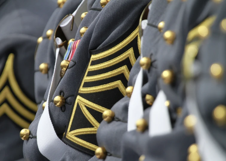 a group of soldiers wearing different uniform styles