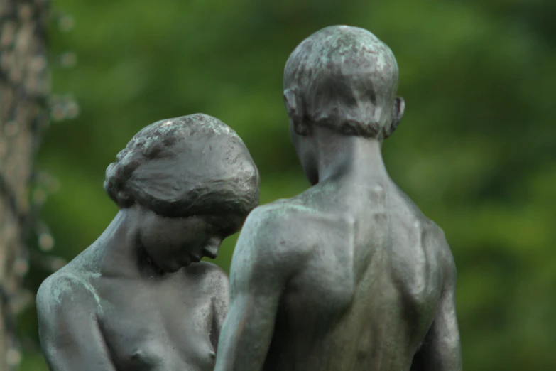 a close up of a statue with a blurry background