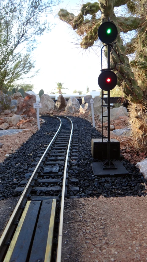 a railroad crossing with a red light