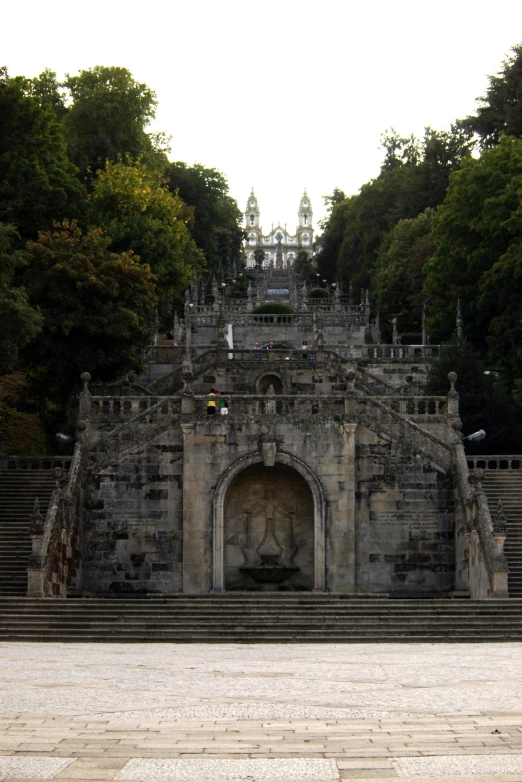 a bunch of steps next to a large stone building