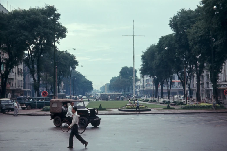 a person walking across a city street