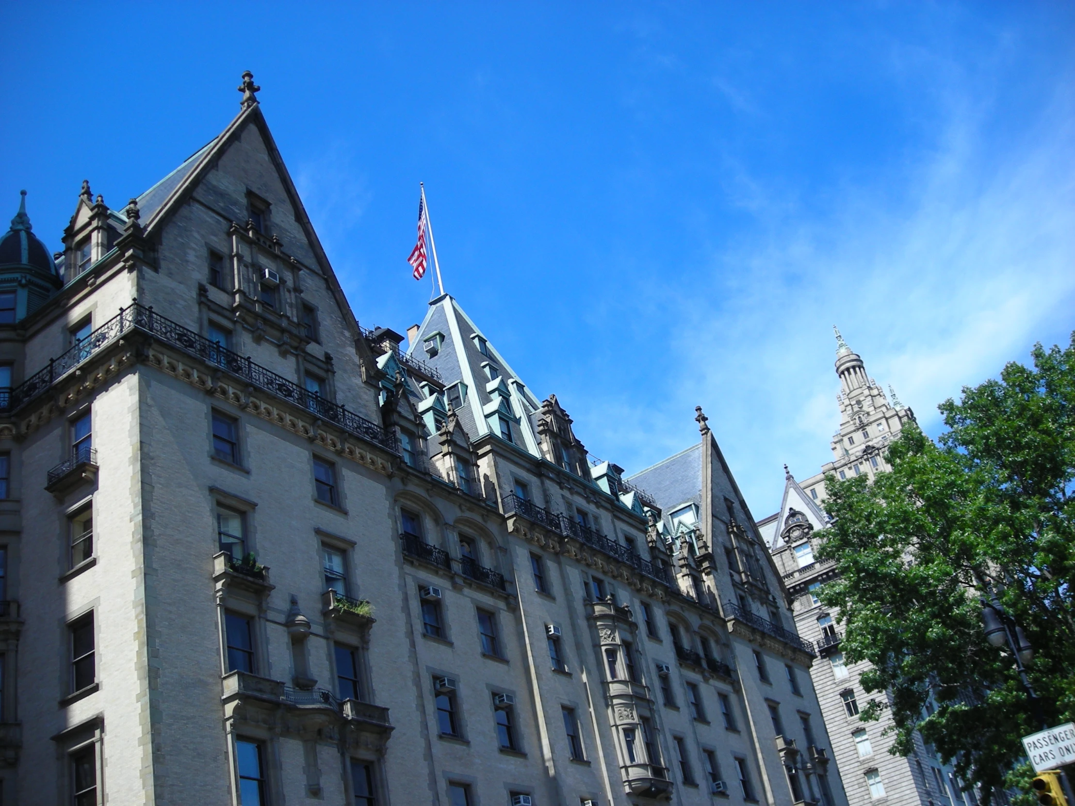 a large white building with a clock on top