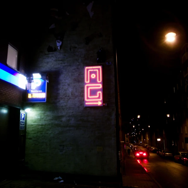 the city street has an urban feel that is in neon light