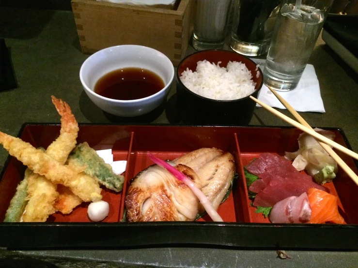 several small food items sitting in a tray