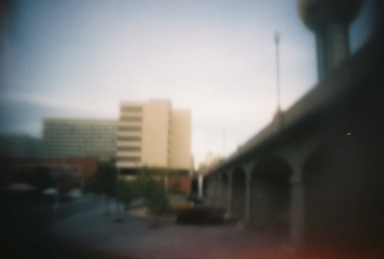 blurry image of the city from a train