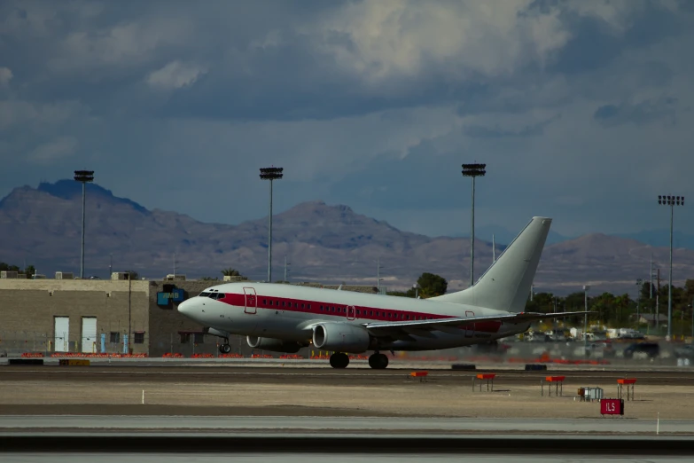 airplane on a runway on a cloudy day