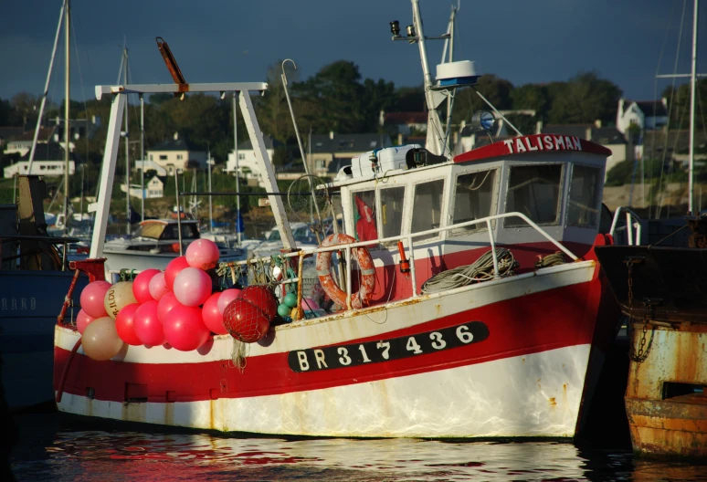 a boat is tied up to the dock