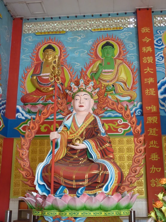 a painting on a wall depicting the god in the middle