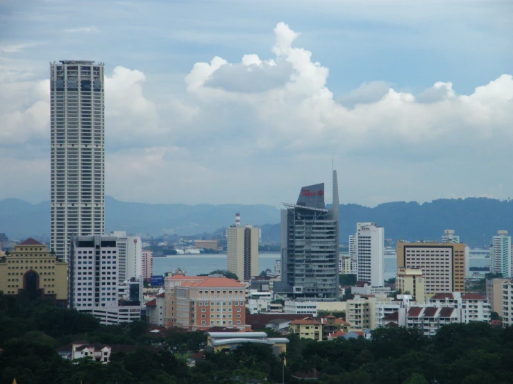 a view of some buildings overlooking a body of water