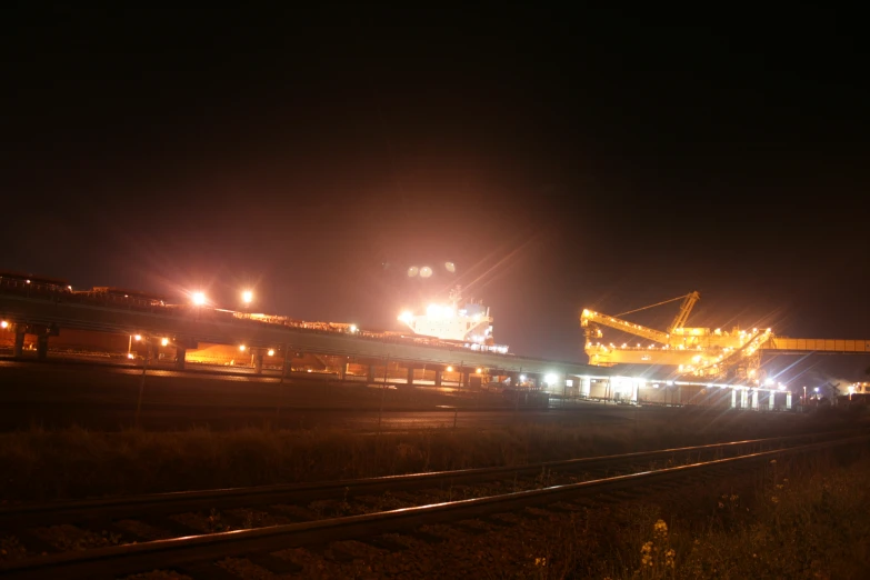 a freight carrier at night loading cargo