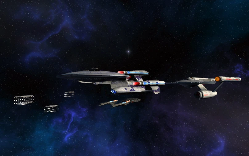 a star trek ship with two vehicles flying over it