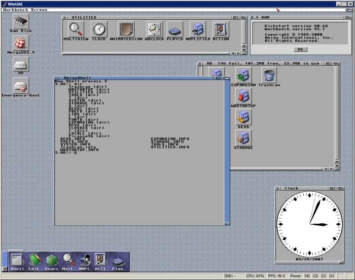 a computer screen showing a clock with a window and several other windows, including a panel with different images
