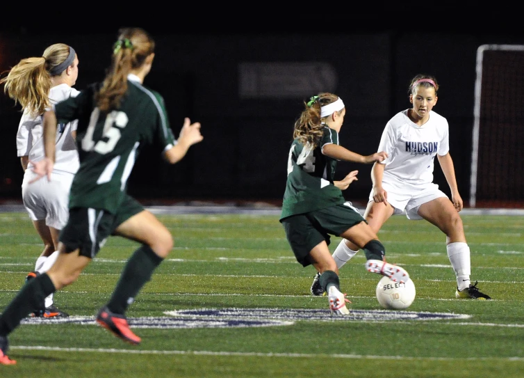 two teams are trying to get their way through the ball