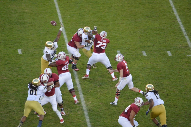 a football game is in progress and players have the same uniform number