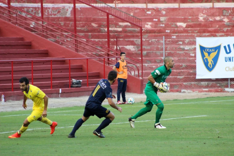 a group of young men playing a game of soccer