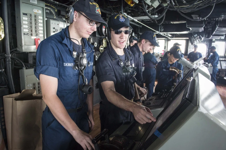 a few pilots standing next to each other