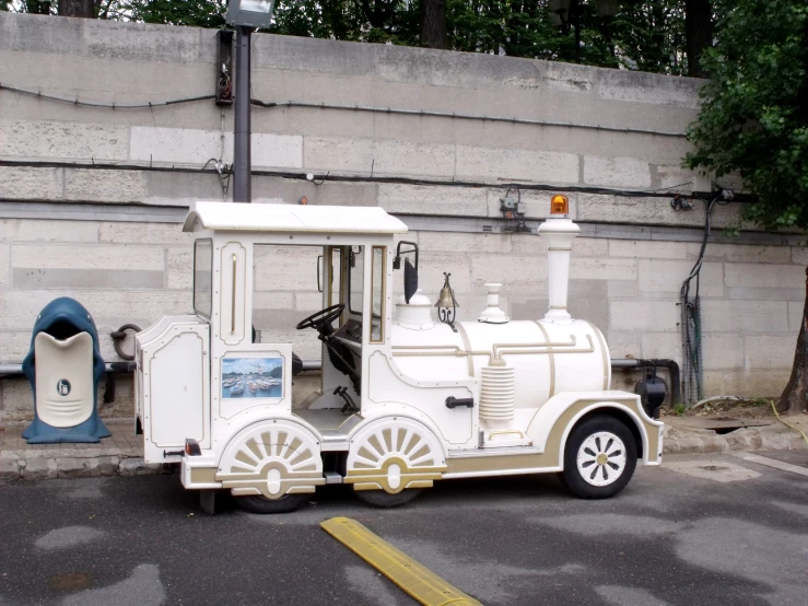 an outdoor car is painted like a train