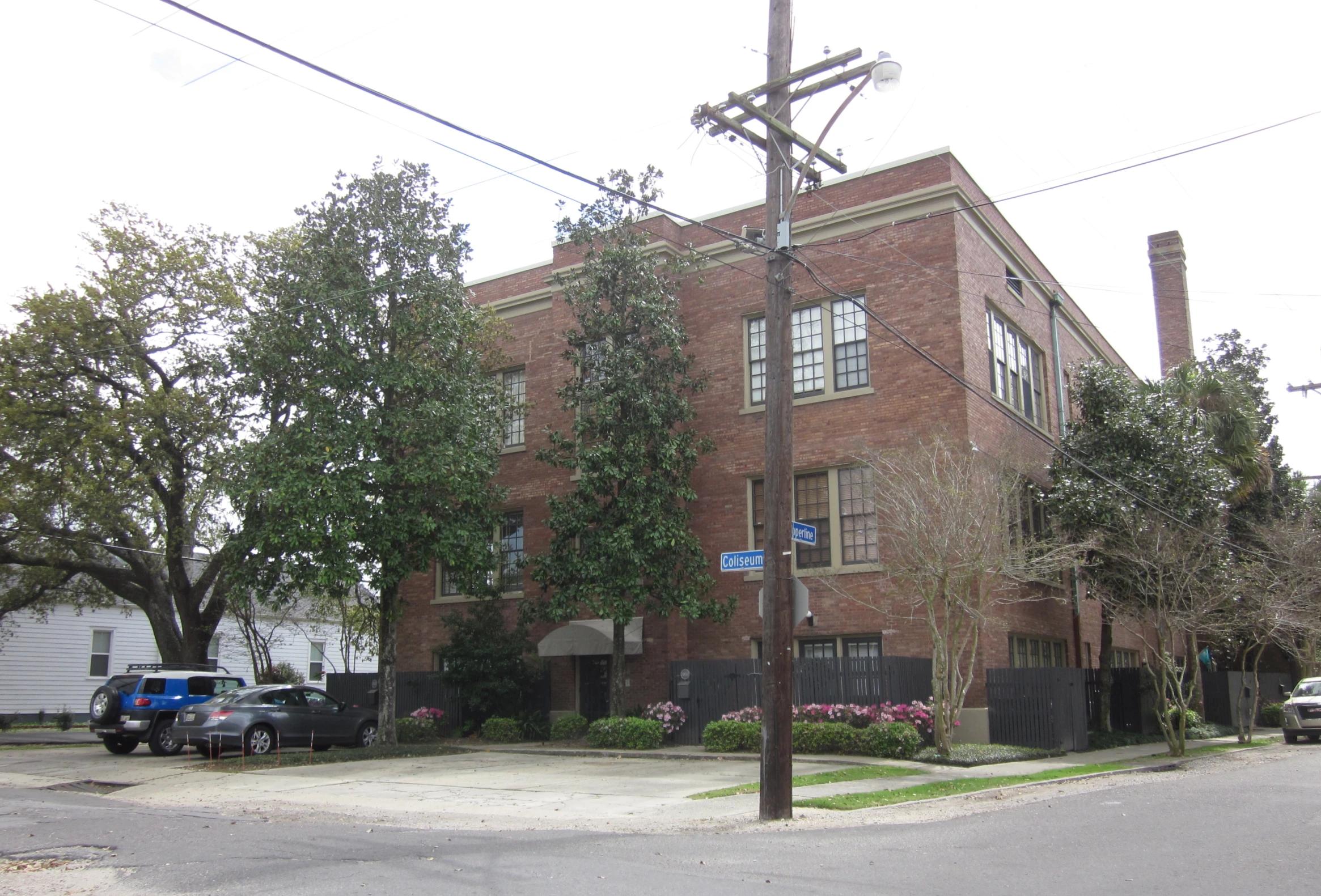 a building with cars parked in front of it