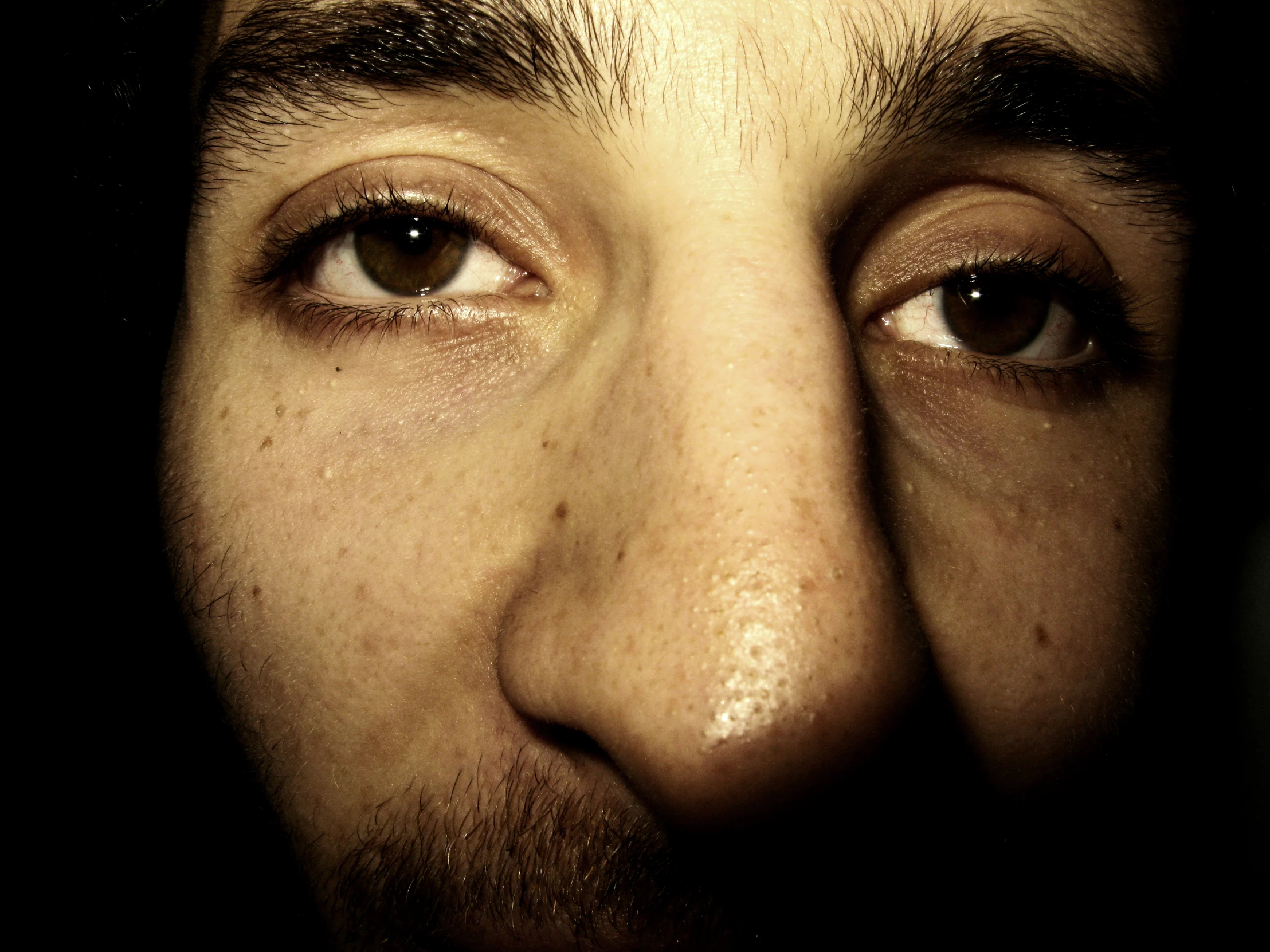 the eyes of a young man showing different parts of his body