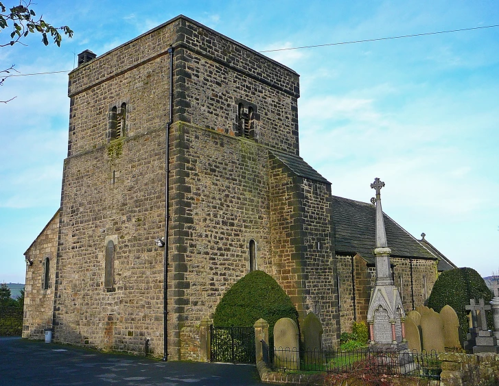 a very old church with a big bell on it