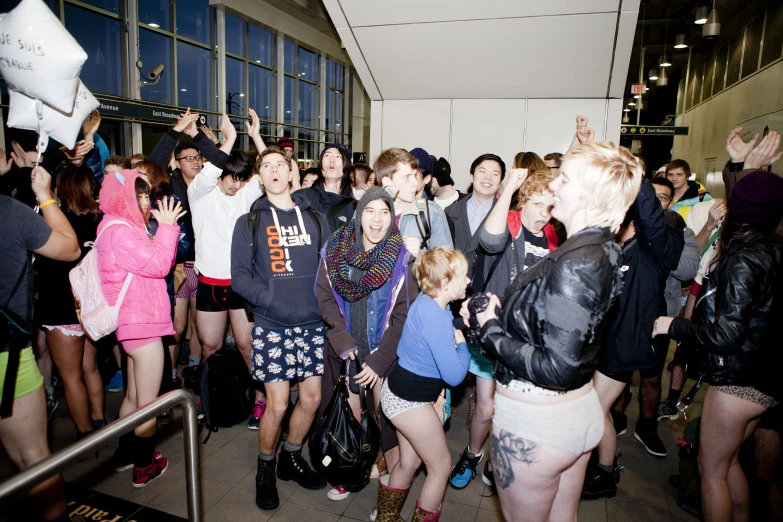 a group of people gathered together at the airport