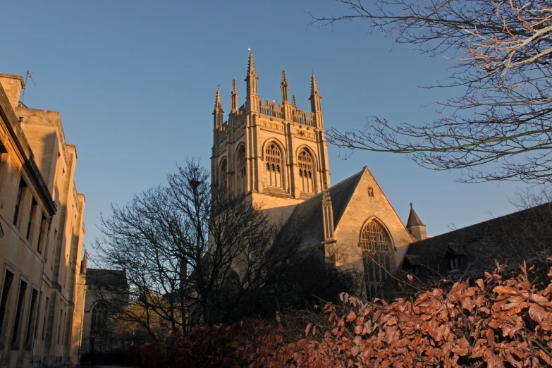 a church is seen against a clear sky