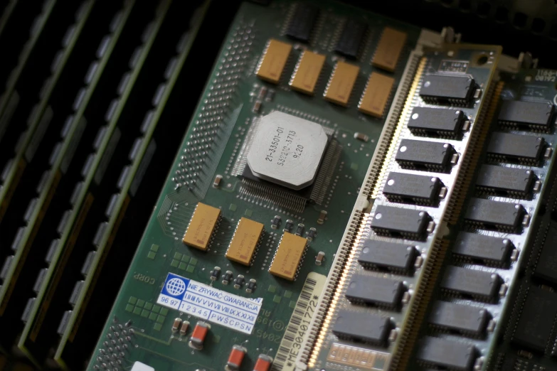 the front of the motherboard has several different type of chips