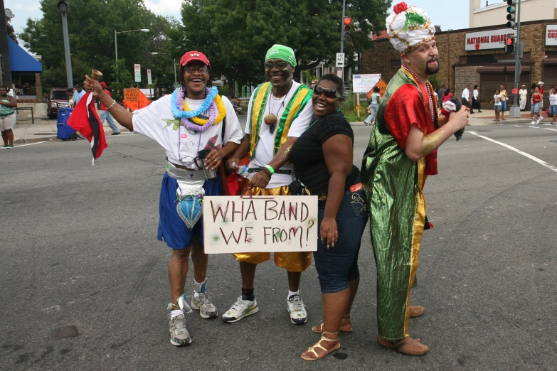 people with a sign on the street protesting at gay pride