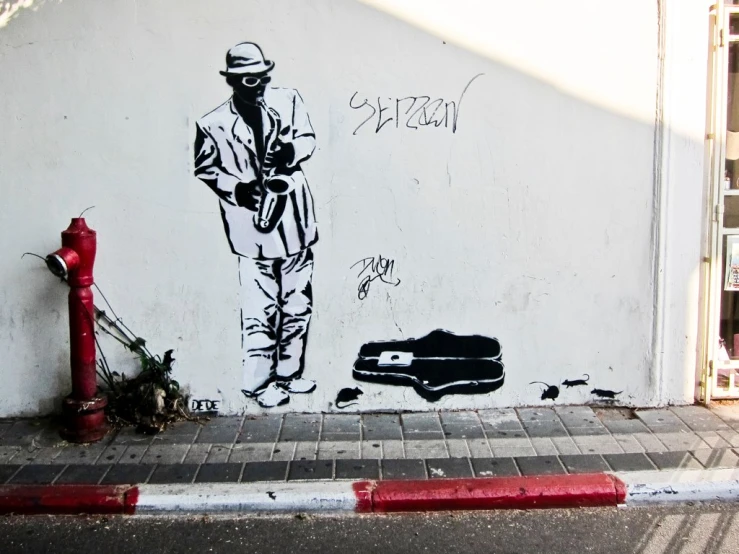 a graffiti of a street performer, with his feet in a black shoe