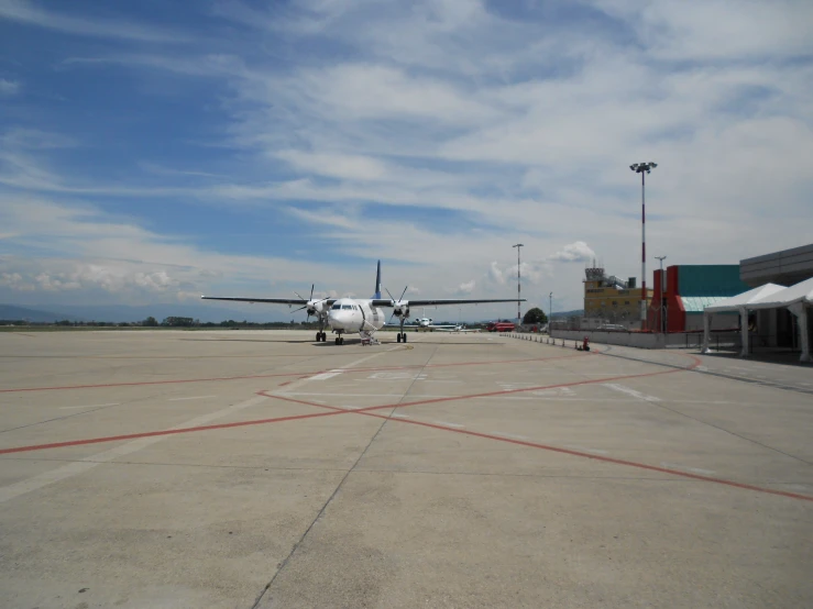 an airplane on the tarmac with it's wheels still on