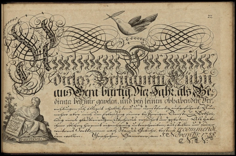 a letter with an eagle, bird and swirl design on the back