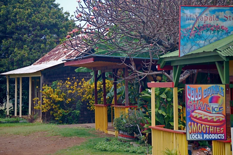 a gazebo and signs are shown on the street