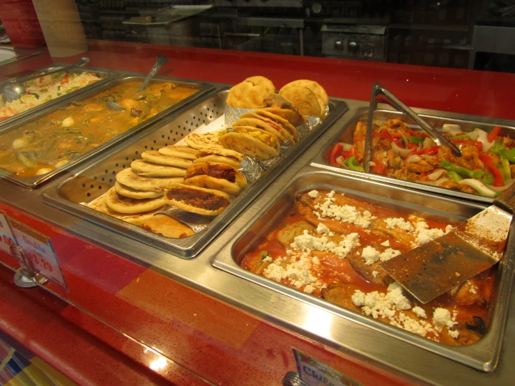 a variety of buffets including sandwiches and salad