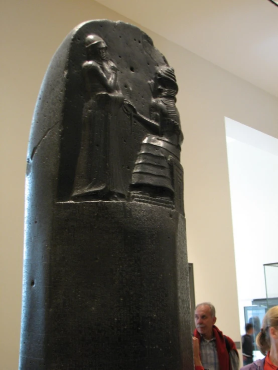 a statue of an egyptian god in the museum