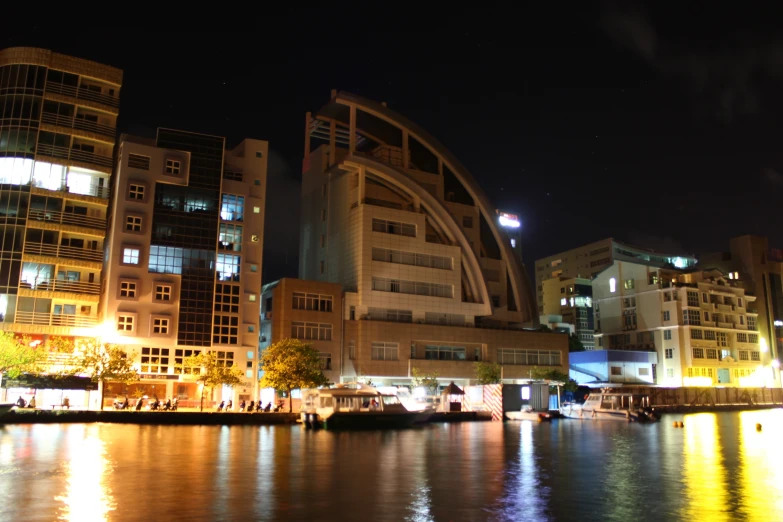 city at night lit up on the waterfront