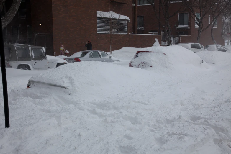 piles of snow outside a house in the winter