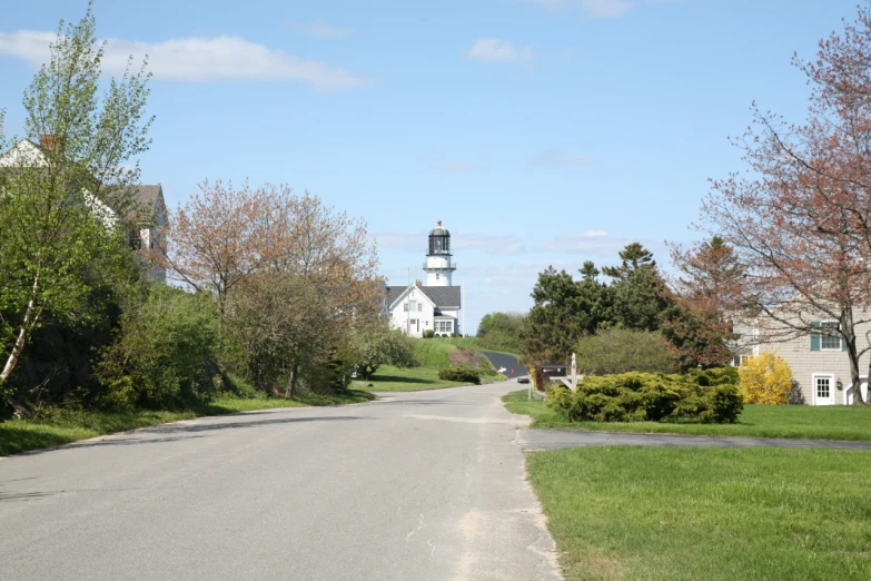 a quiet rural road with small houses