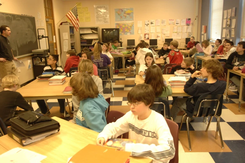 a classroom full of children with their teacher