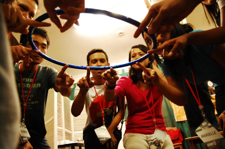 a group of young people practicing their acrobatic ss