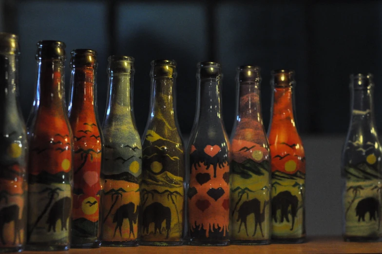 several old glass bottles with various designs and sizes