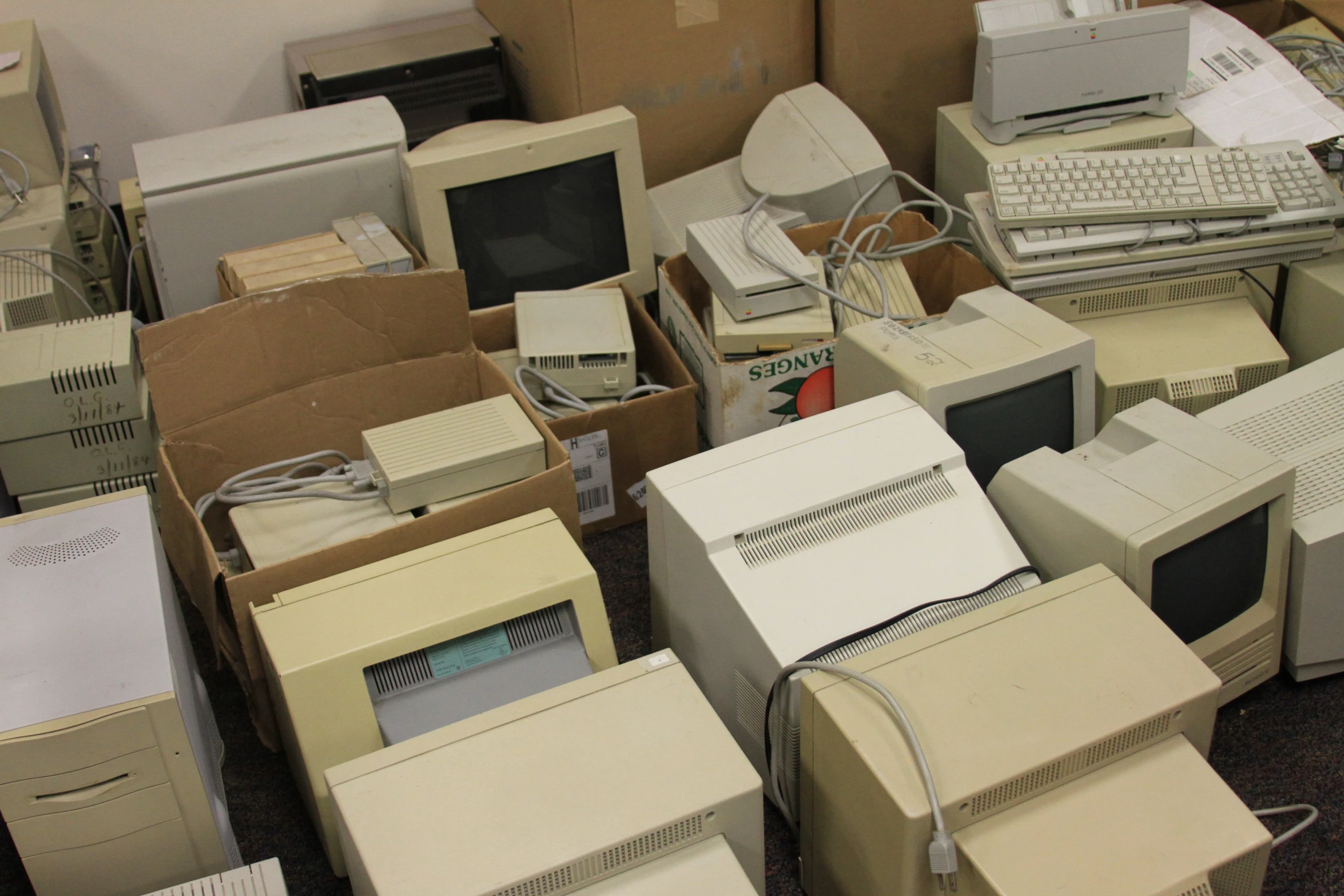 a room full of old and used computer equipment