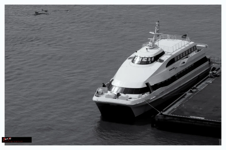 a white boat that is docked in the water