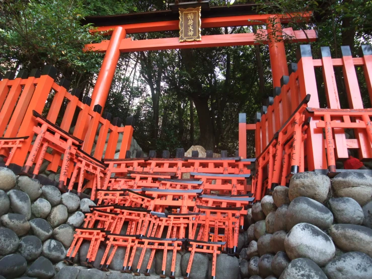 many orange and red gates on the ground