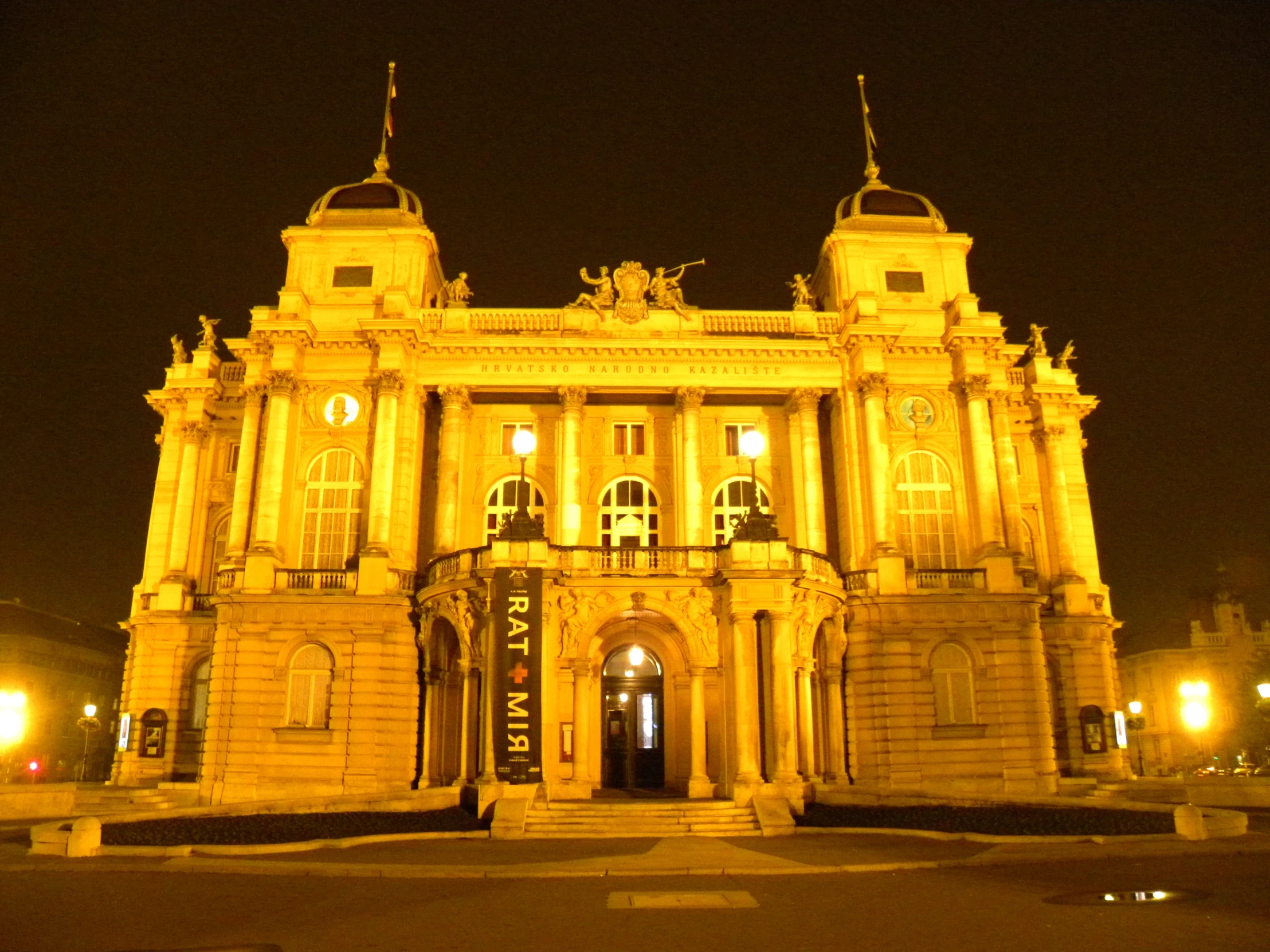 there is a large building that is lit up