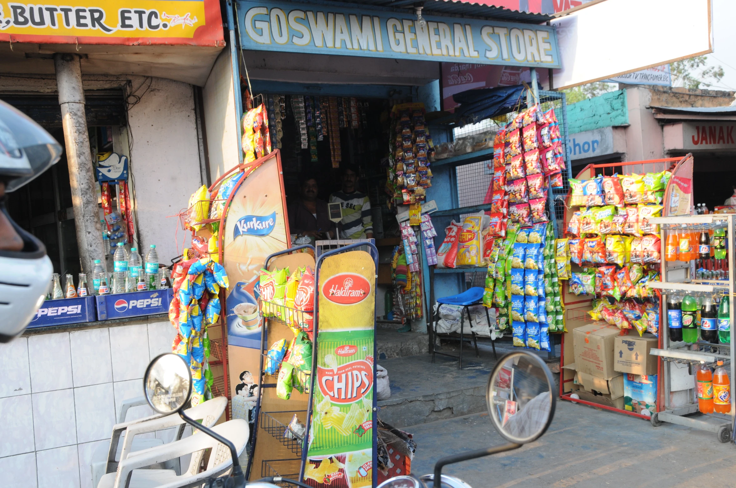 some storefronts that are outside with some signs