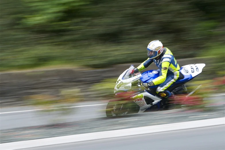 a person riding on the back of a motorcycle