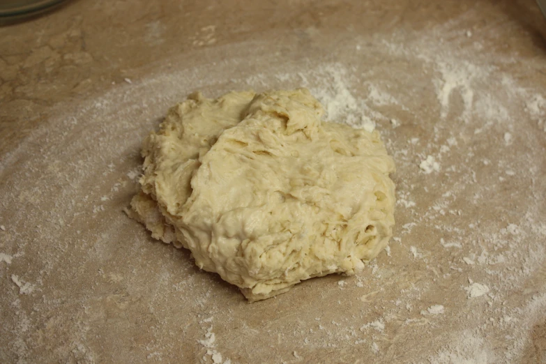 the uncooked pastry dough is sitting on the table