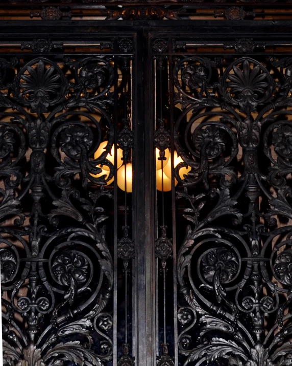 decorative wooden wall with an intricate design above it