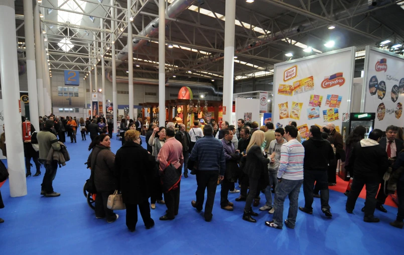 several people in a large convention building