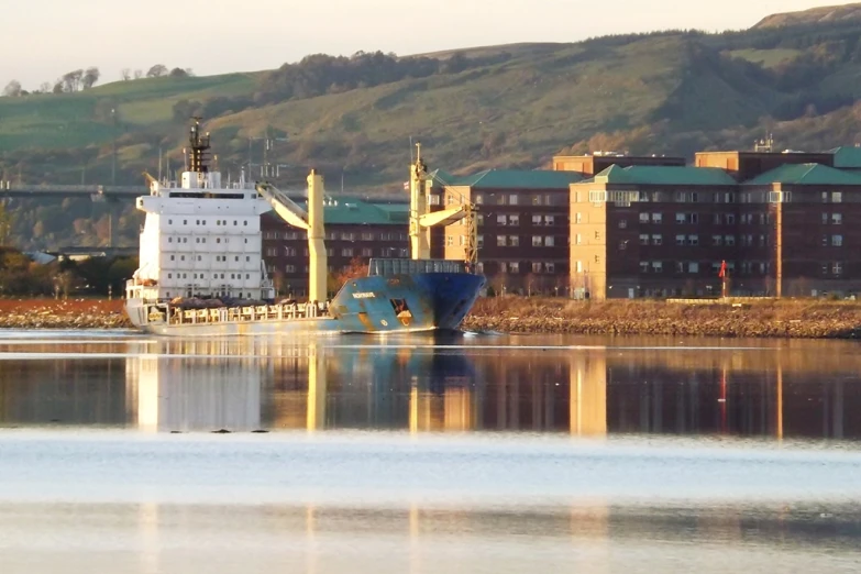 an ocean liner is docked in a body of water